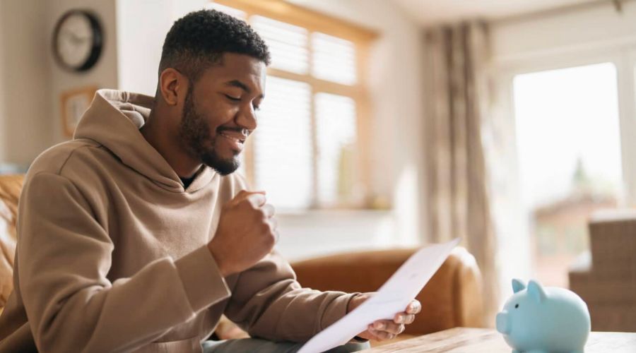 man working on his finances
