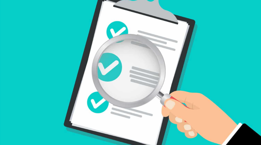 checklist with magnifying glass