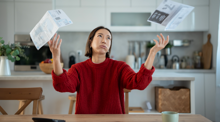 overwhelmed woman budgeting
